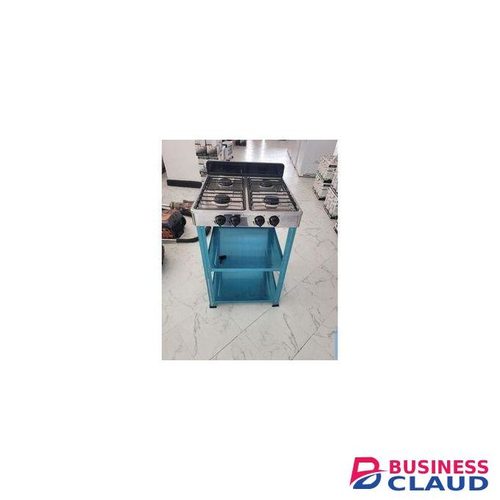 four burner standing gas stove with shelves