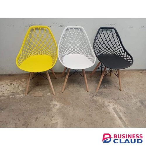 Modern Eames-style mesh dining chairs