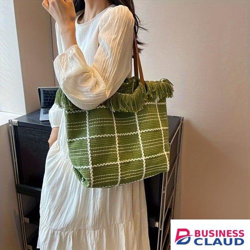 Large woven tote bag with a green and white pattern