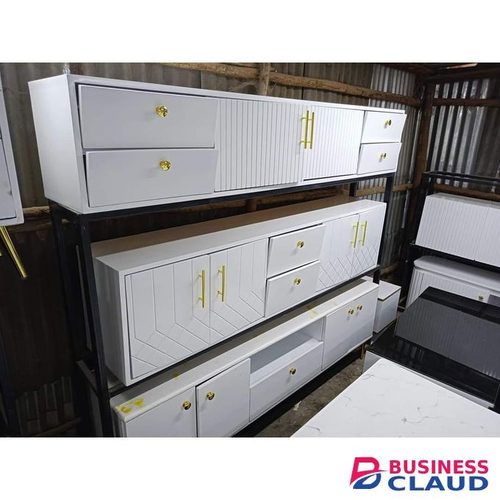 Modern White Cabinet with Gold Handles and Textured Panels