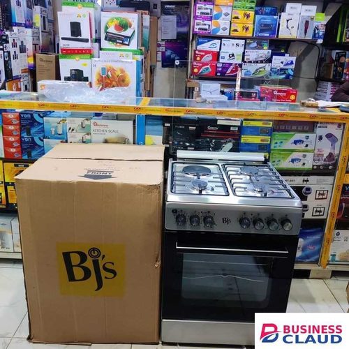 BJS INOX Silver 60x60 Standing Cooker 3 Gas Burners 1 Electric Hot Plate Electric Oven With Turbo Fan Rotisserie Grill Auto Ignition Glass Top Mechanical Timer Thermostat Double Glass Oven Door