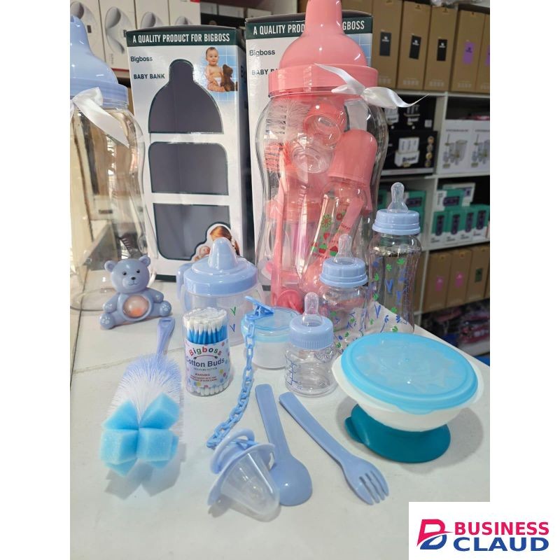 Baby care kit with feeding bottles, mini feeder, training cup, bowl, storage box, and baby accessories