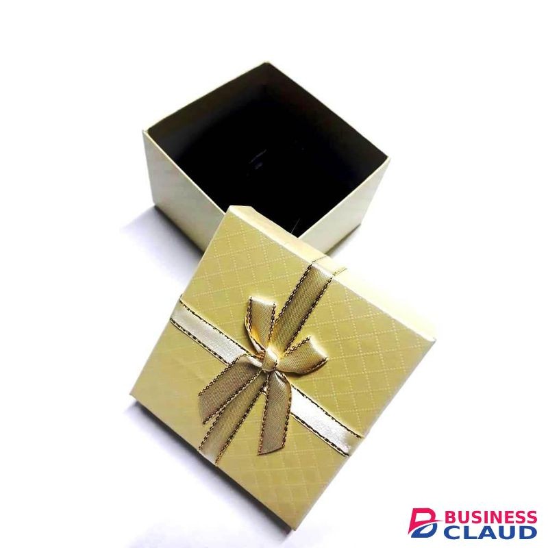 A golden yellowish gifting box best for presenting gifts and surprises