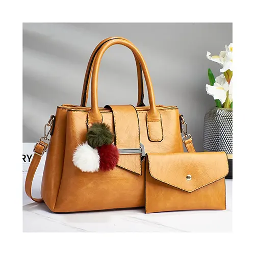 Yellow Ladies Leather Handbag Size 32Ã—23 for everyday use