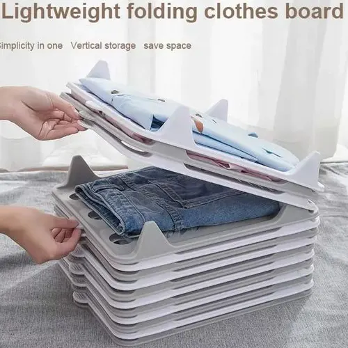 Creative wardrobe clothes folding board