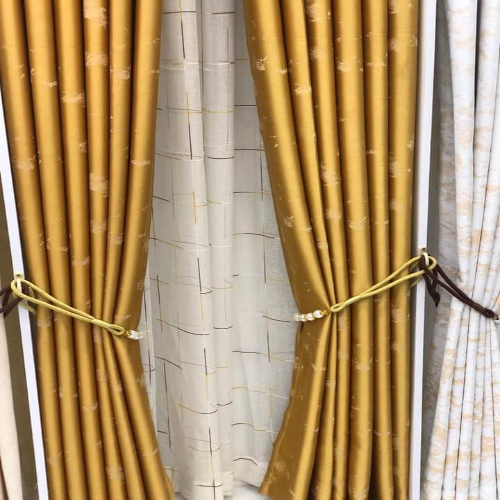 Elegant_golden_brown_curtain.jpeg